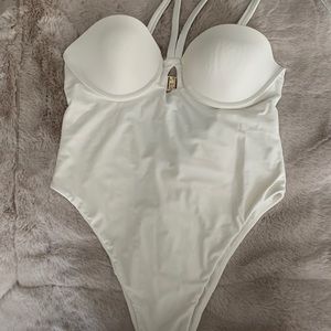 Camila Coehlo white strappy one piece bathing suit